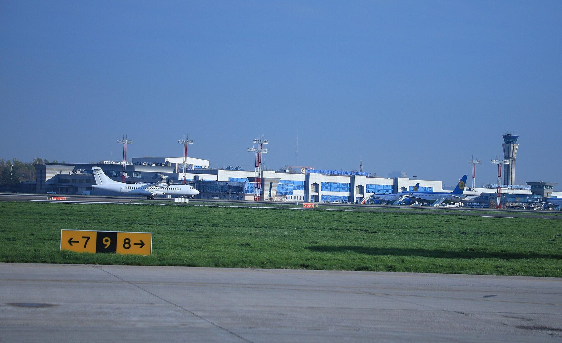 Airport or transfer scene in Tashkent